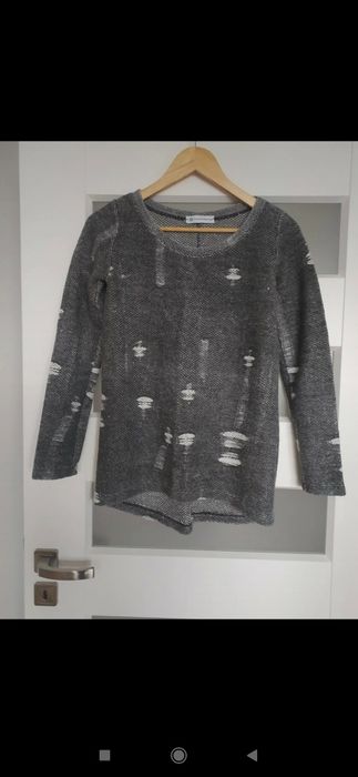 Bluza z imitacją przetarć firmy Szachownica