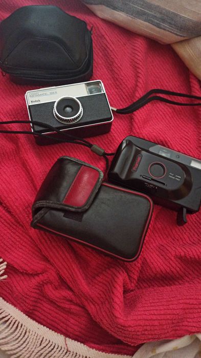 Máquina digital e antigas de rolo