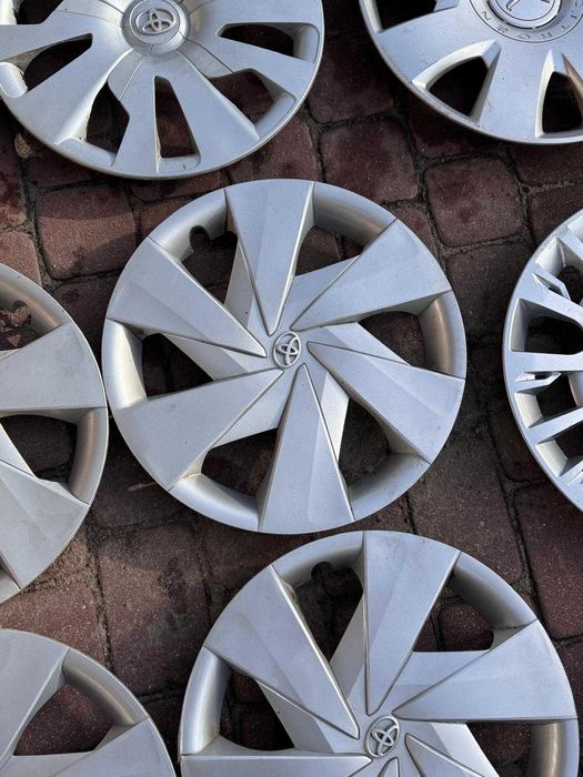 '15 Kołpaki komplet oryginalne Toyota Yaris Auris Aygo Avensis Proace