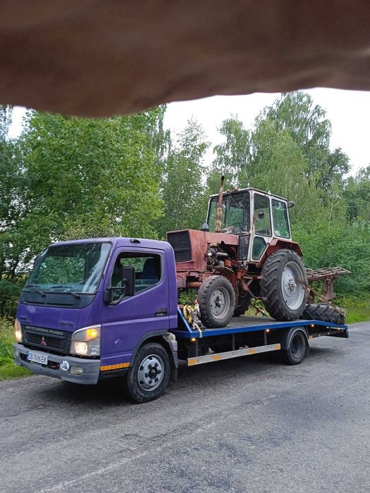 Вантажний евакуатор Чернігів та обл. Перевозка тракторів, спецтехніки