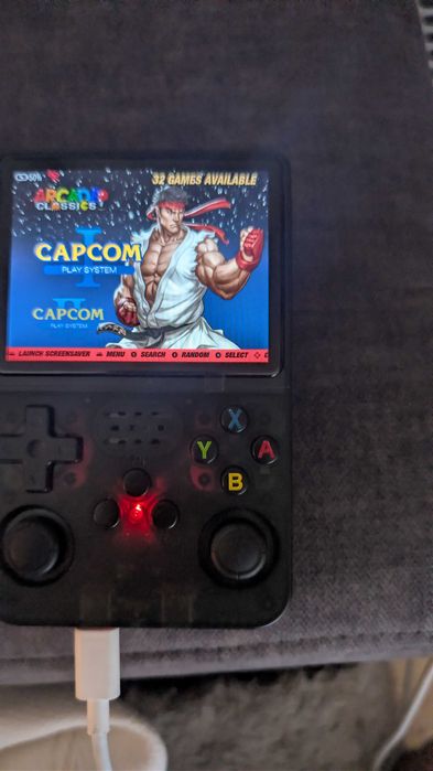 Consola Jogos Portátil R36S usada com jogos e cartoes de memoria