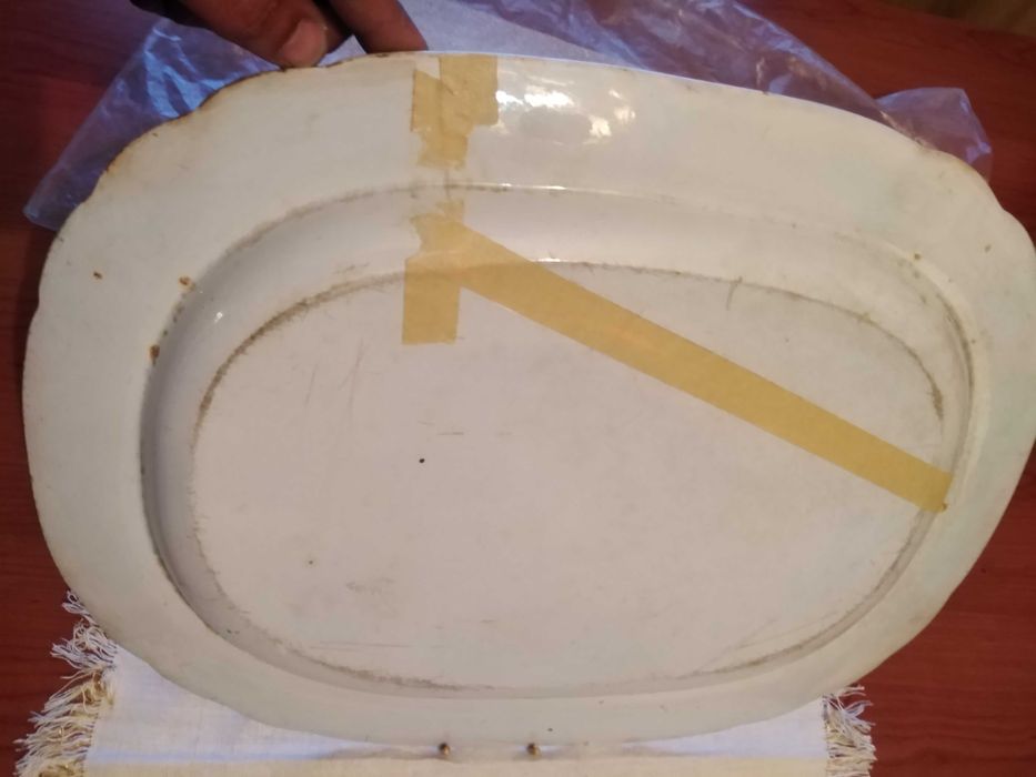 prato porcelana antigo com uma racha