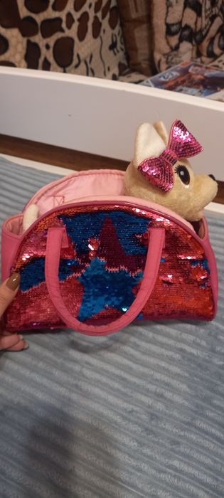 Чічі Лав в сумочці