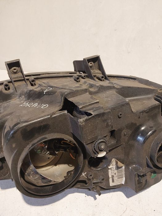 Fiat Bravo II 2 lewa lampa przednia przód reflektor lewy przedni