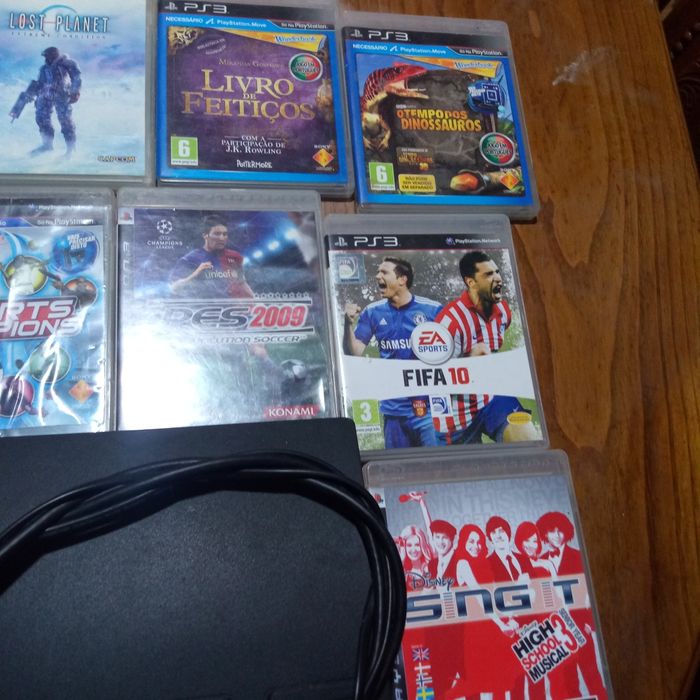 PS3 com vários jogos em bom estado