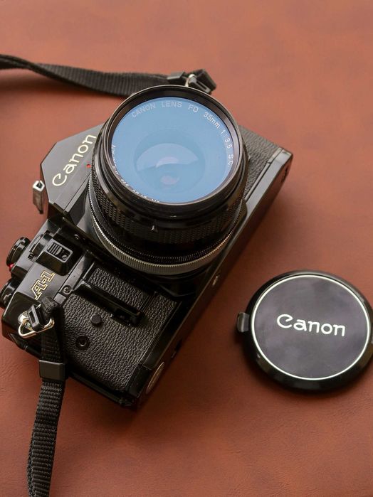 Canon A-1 + lente FD 35mm + flash – Excelente Estado
