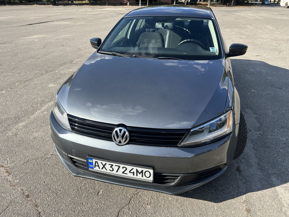Volkswagen Jetta 2014 Газ-бензин