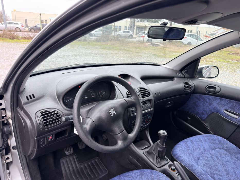 100 mil kms 206 comoletamente nova