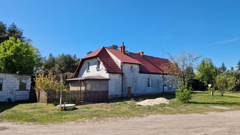 Działka z domem i zabudowaniami