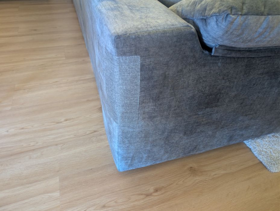 Sofá-cama com chaise longue em tecido cinza escuro