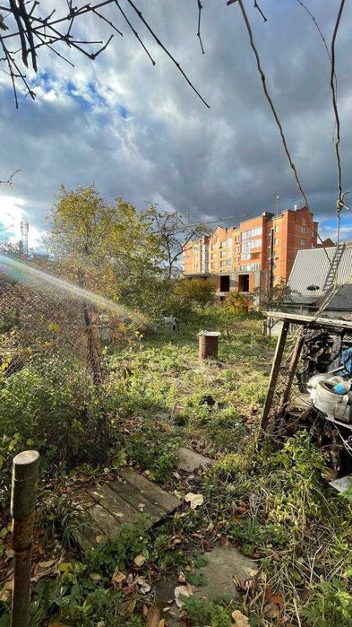 Продається земельна ділянка 7.74 сотих з цегельним будинком