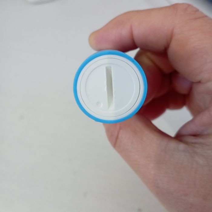 Escova de dentes a pilha, Colgate.