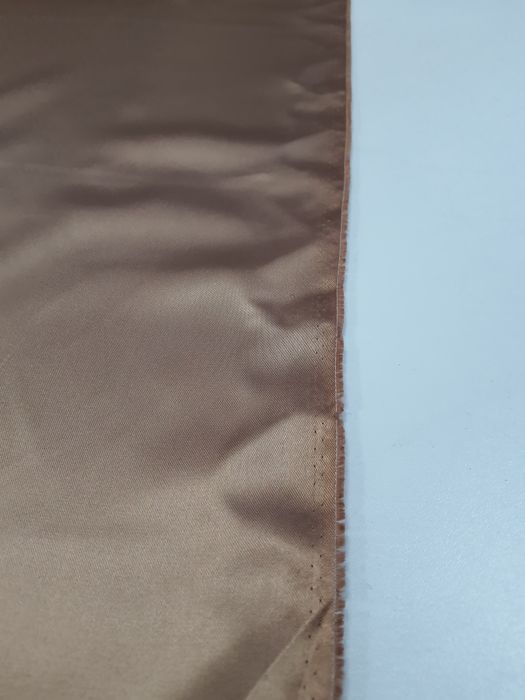 Podszewka atłasowa beż szer.142 cm.