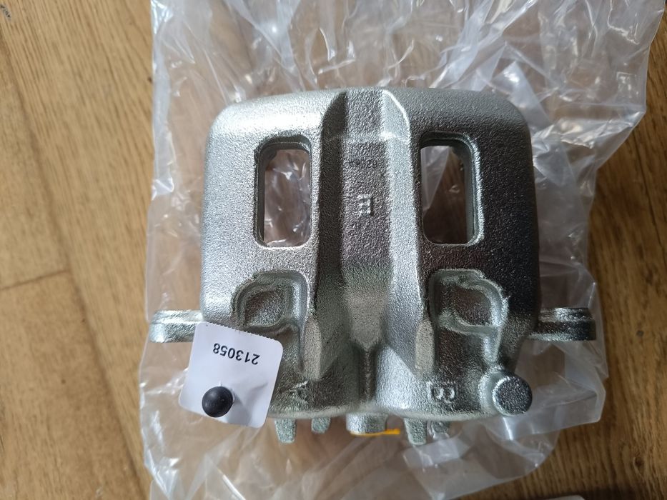 Гальмівний супорт передній правий NK 213058  Mitsubishi Pajero III -IV