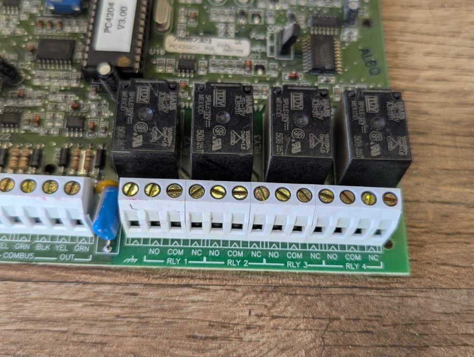 Модуль питания/релейного выхода/повторителя сигнализации DSC PC4204CX