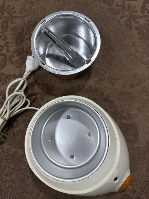 Panela de cera para depilacão