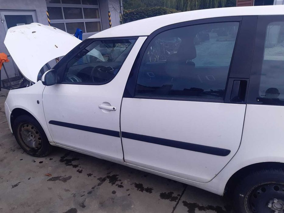 Roomster 1.9 tdi BSW - drzwi lewe 1026