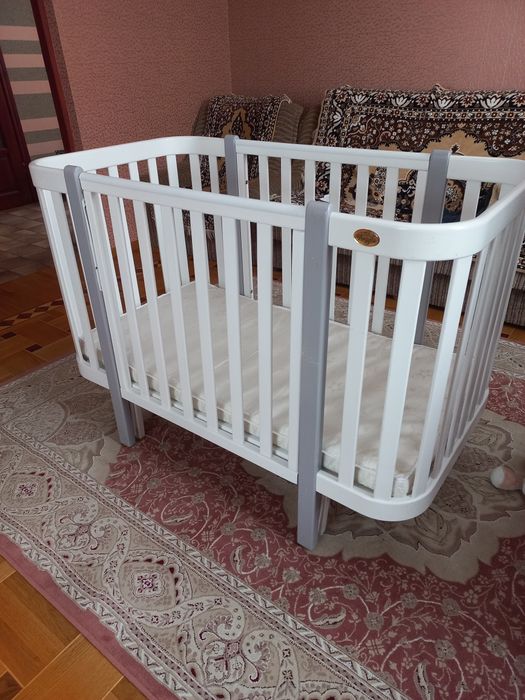 Дитяче ліжечко Angelo Magic.