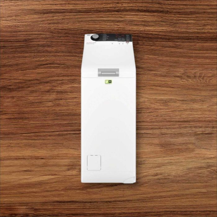 Пральна машина бу AEG L7TS84379 з вертикальним завантаженням 7 кг