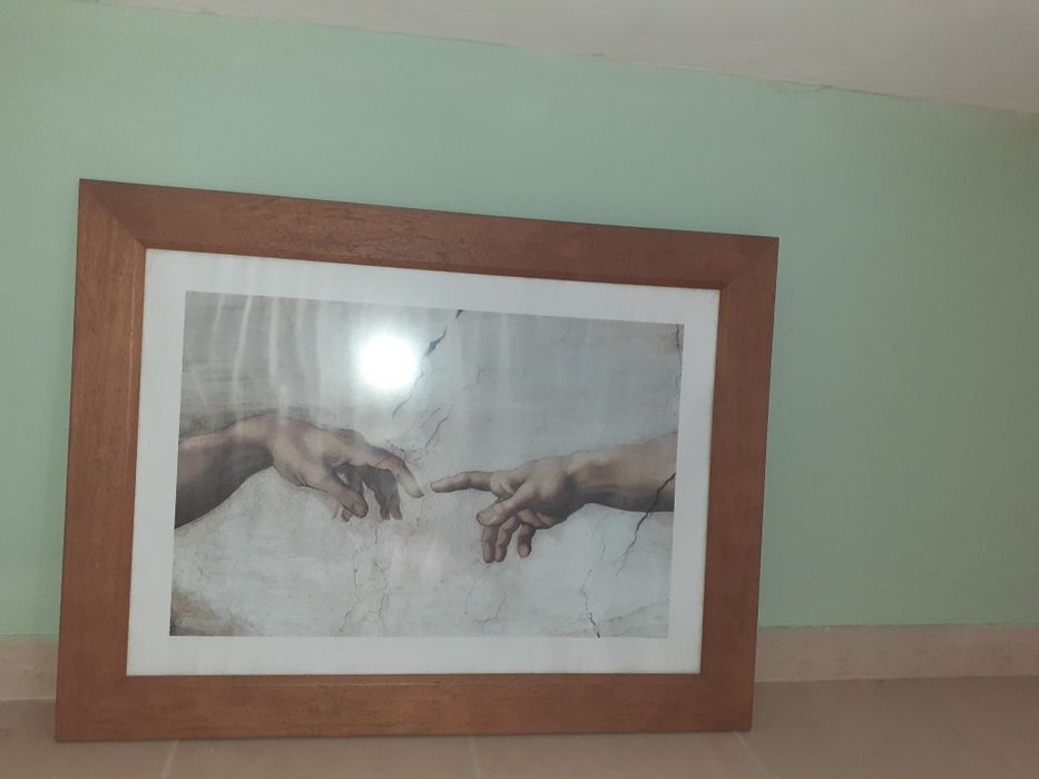 Quadro a mão de Deus, ou a criação de Adão. MiguelÂngelo