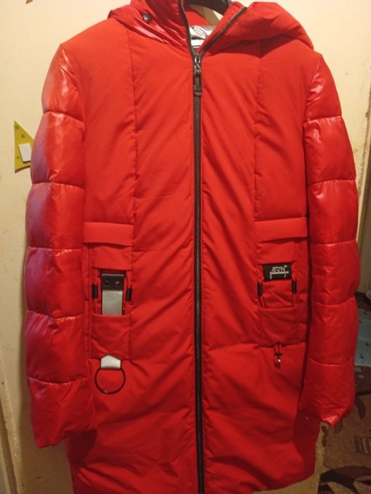 Жіночий пуховик в чудовому стані