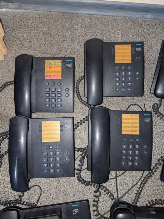 Стаціонарні телефони Siemens і Panasonic