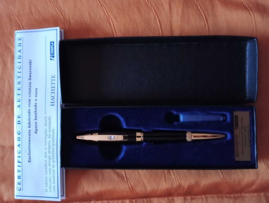 Vendo caneta hachete banhada a ouro