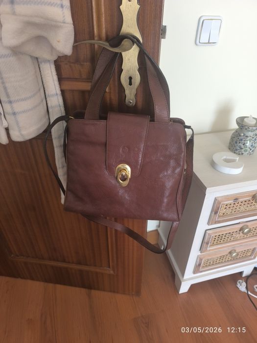 Mala castanha em pele