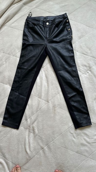 шкіряні чорні джинси із сердечками