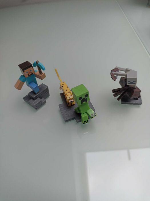 Minecraft figurki Steve, Spider Jockey, Creeper z Ocelotem + pudełka