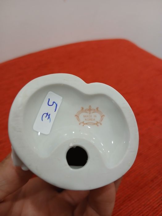 Estatueta em Porcelana