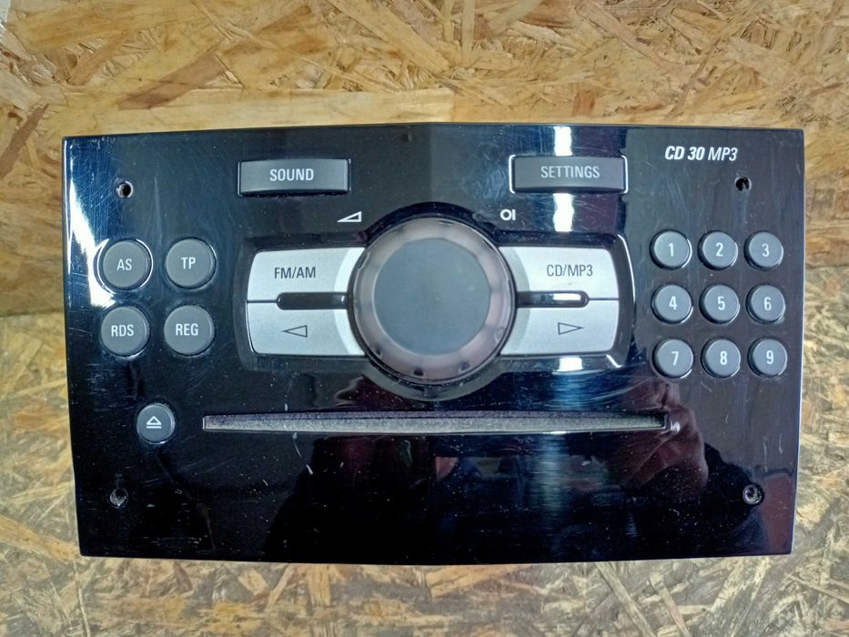 Opel Corsa D Astra H radio odtwarzacz CD piano black oryginał