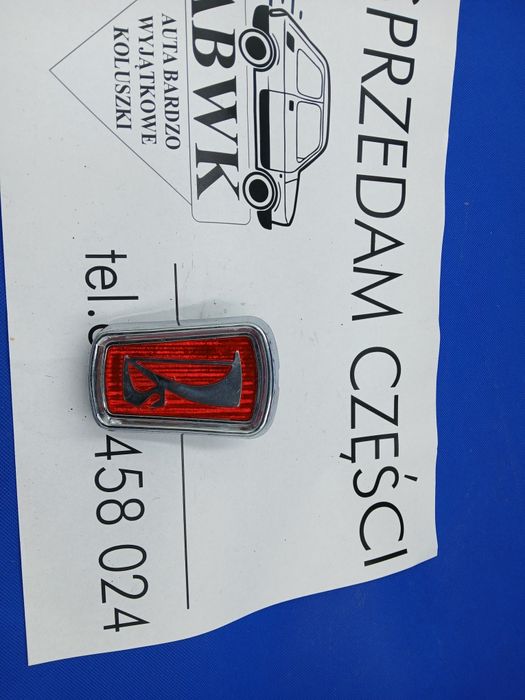 Emblemat w przednią atrapę łada