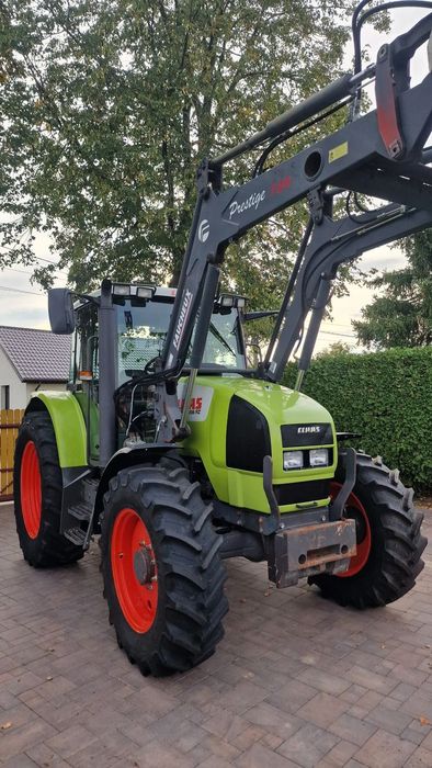 Claas ARES 556 RZ, silnik 4cyl JOHN DEERE 105 koni, świeżo sprowadzony  miękka kabina, nowe opony, ładowacz, krokodyl