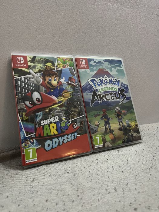 Nintendo Switch OLED + 2 gry