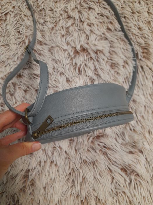 Кругла сумочка, шкірозамінник