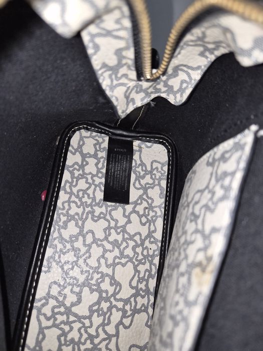 Mala Tous  a tiracolo Kaos