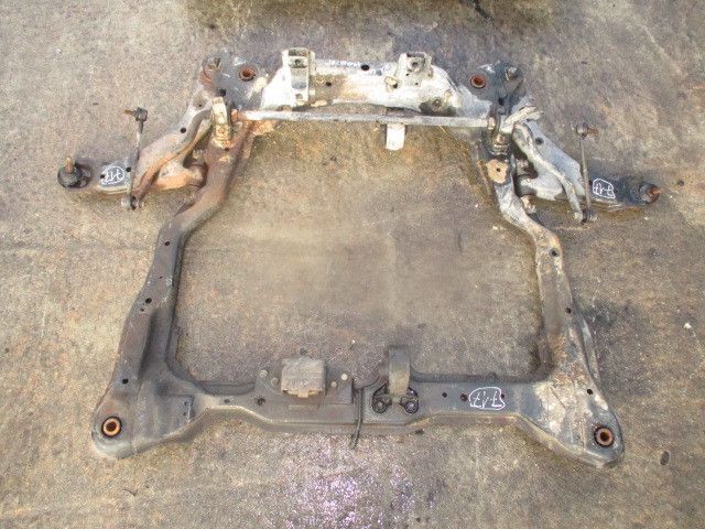 Charriot frente KIA Cerato Sedan (LD)