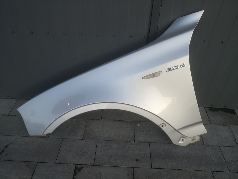 Błotnik lewy przedni BMW X3 e83 titansilber 354/7 w kolor długi