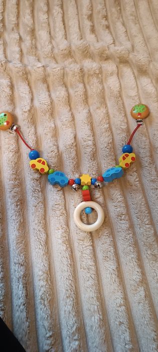 На коляску розтяжка машинки