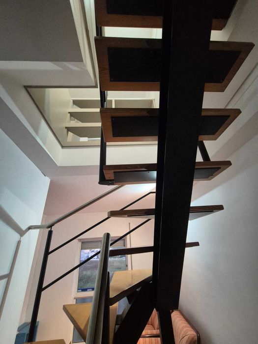 Escada "caracol" interior