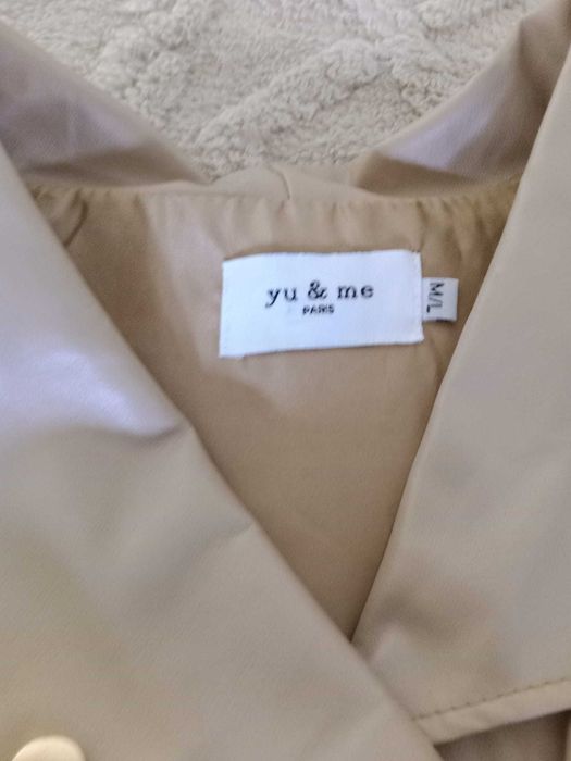 Colete You e Me Paris, muito bem cuidado.