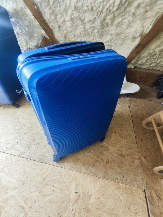 Walizka Puccini uszkodzona wysuwana rączka