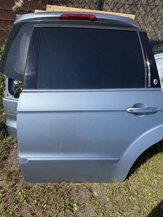 Drzwi Ford Galaxy mk3  lakier 86 lewe szyba drzwi