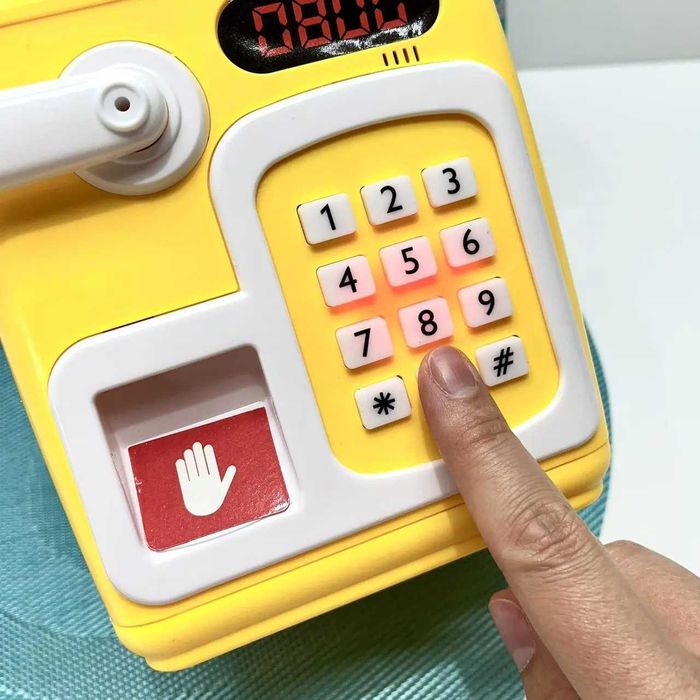 Сейф-копилка с кодовым замком затягивает купюры звук подсветка Желтый