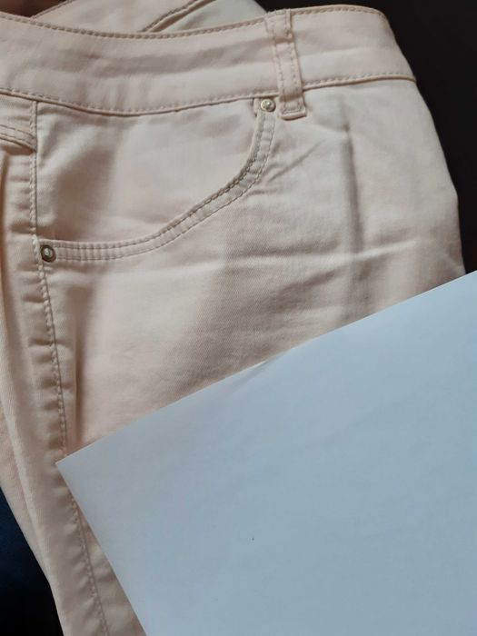 Bawełniane jasne jasnoróżowe proste spodnie Promod rozmiar 40