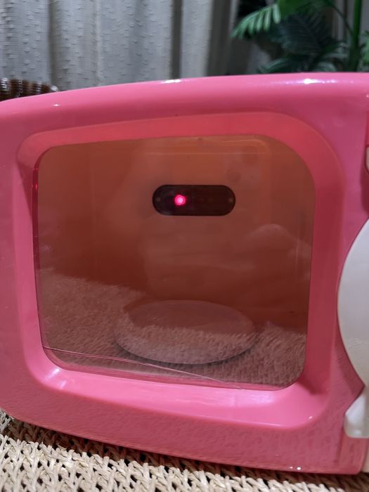 Microondas cor de rosa de brincar