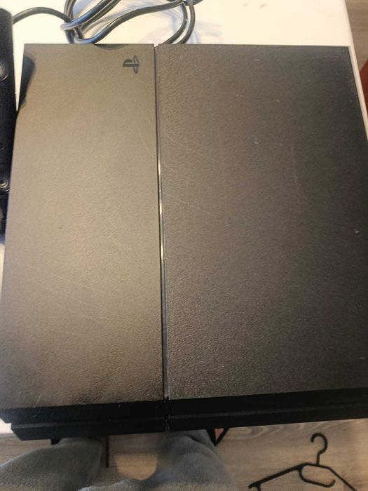 Ps4 com câmera 2 comandos e 2 jogos