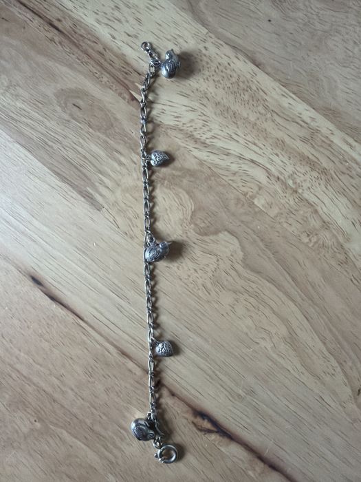 Pulseira com berlocos de prata