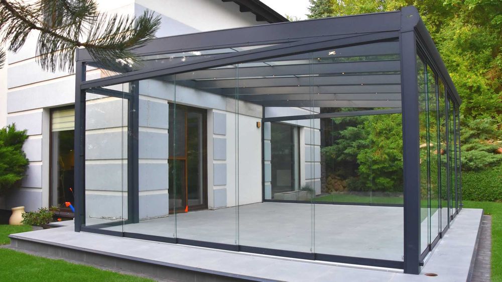 Szklane zadaszenie tarasu ogród zimowy